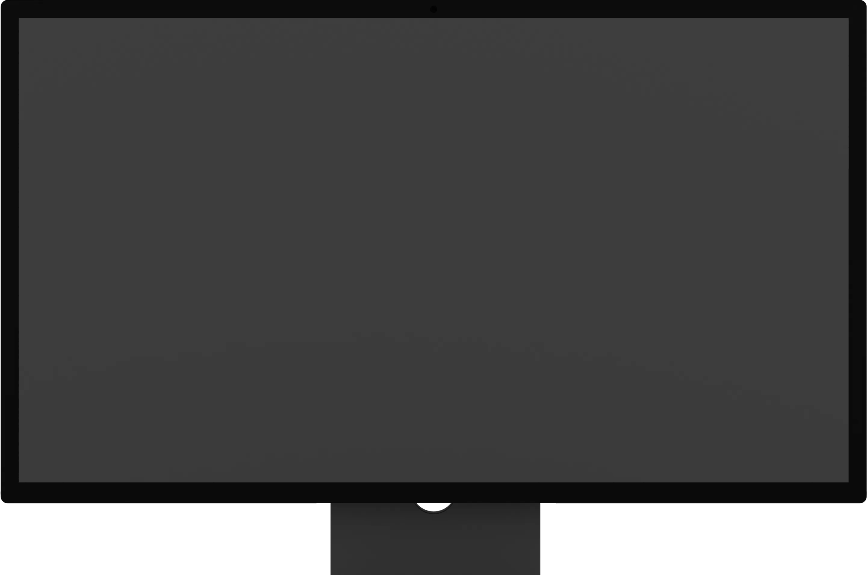 The Ghost homepage on a desktop monitor